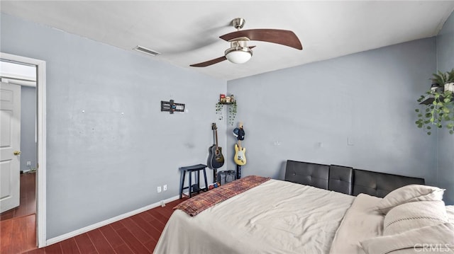 6048 Fidler Ave, Lakewood, CA 90712 - bedroom with wood finished floors, baseboards, and a ceiling fan