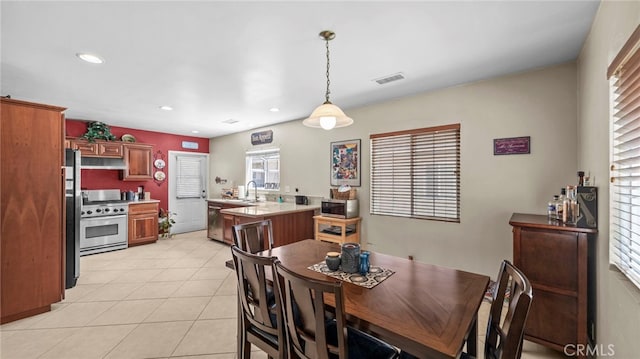 6048 Fidler Ave, Lakewood, CA 90712 - dining area with recessed lighting and light tile patterned flooring