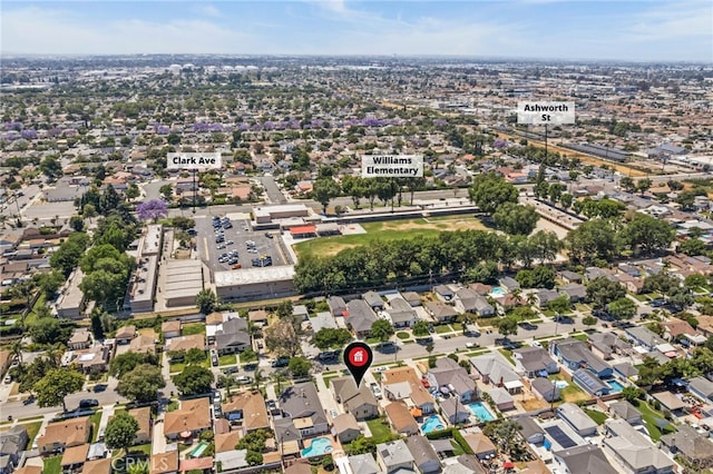 6048 Fidler Ave, Lakewood, CA 90712 - aerial overview of property's location featuring nearby suburban area
