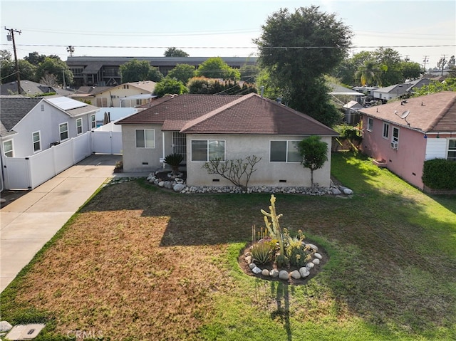 719 S 2nd Ave, Covina, CA 91723 - view of front of house with crawl space, a front yard, a residential view, fence, and stucco siding