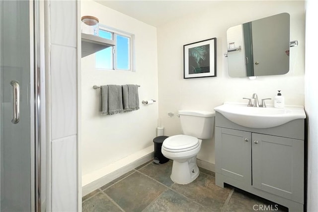 full bathroom with walk in shower, baseboards, vanity, and toilet