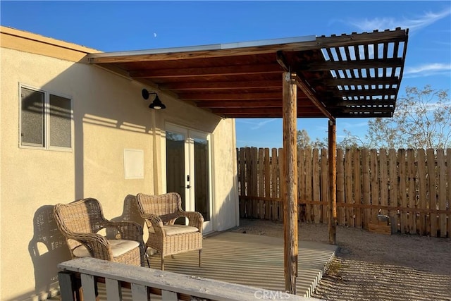 view of patio / terrace featuring fence