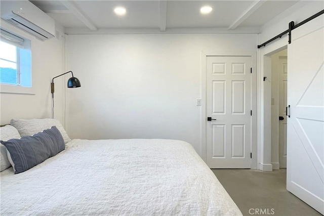 carpeted bedroom featuring a barn door, a wall mounted AC, recessed lighting, and beam ceiling