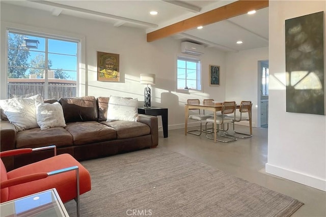 living area featuring a wall unit AC, finished concrete floors, baseboards, beamed ceiling, and recessed lighting