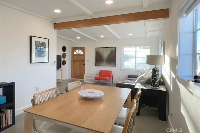 dining area with recessed lighting, baseboards, and beamed ceiling