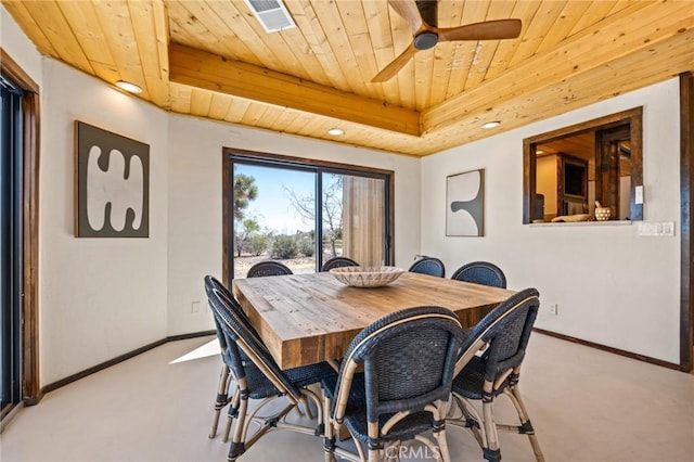 carpeted dining area featuring baseboards, visible vents, wooden ceiling, and a raised ceiling