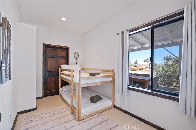 bedroom with recessed lighting and baseboards