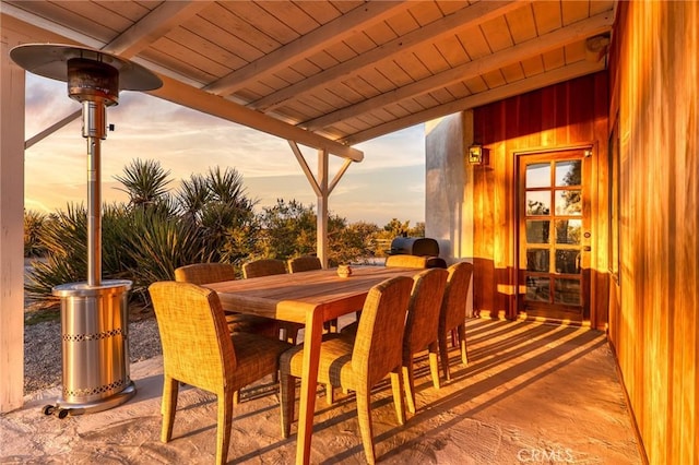 patio terrace at dusk with outdoor dining area