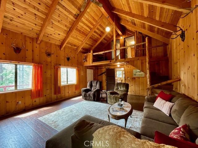 38784 Aspen Ln, Mineral, CA 96063 - living room with wooden walls, wooden ceiling, and beamed ceiling