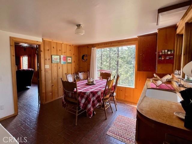 38784 Aspen Ln, Mineral, CA 96063 - dining space featuring wooden walls