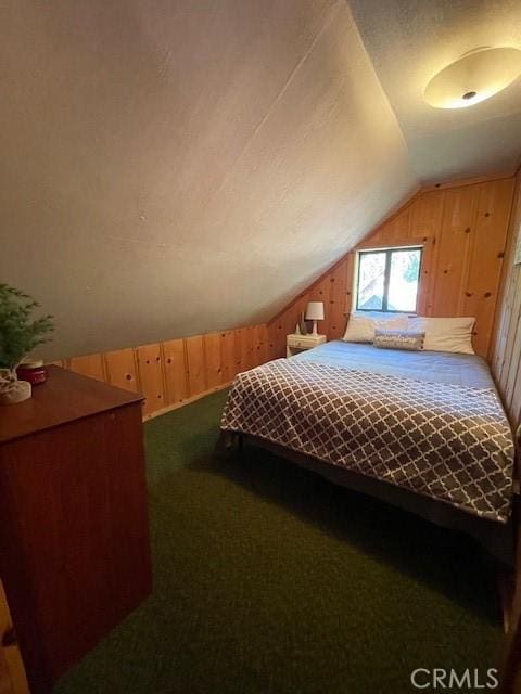 38784 Aspen Ln, Mineral, CA 96063 - carpeted bedroom with lofted ceiling and wood walls