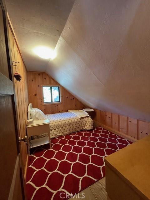 38784 Aspen Ln, Mineral, CA 96063 - bedroom featuring lofted ceiling and wooden walls