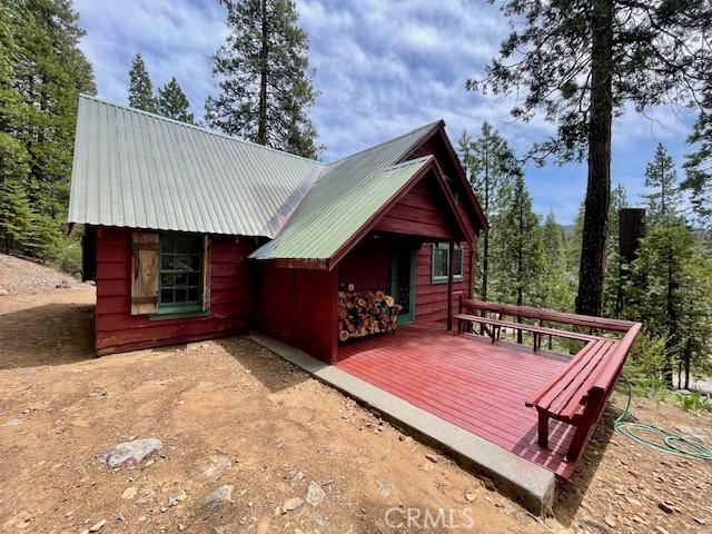 38784 Aspen Ln, Mineral, CA 96063 - view of property exterior featuring metal roof and a deck