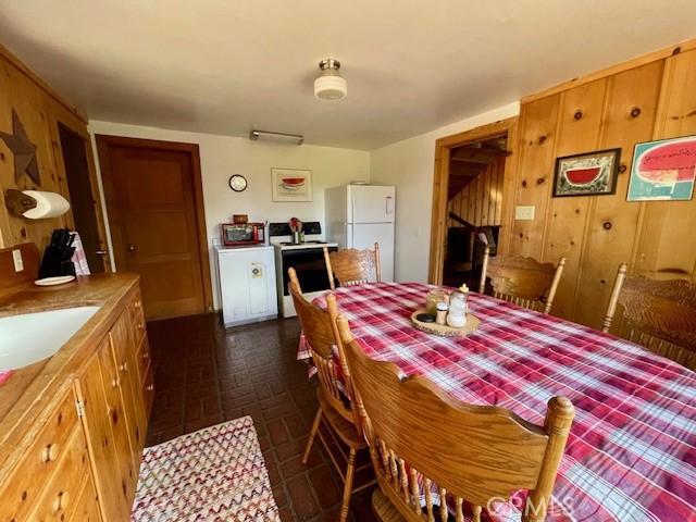 38784 Aspen Ln, Mineral, CA 96063 - dining area featuring brick patterned floors