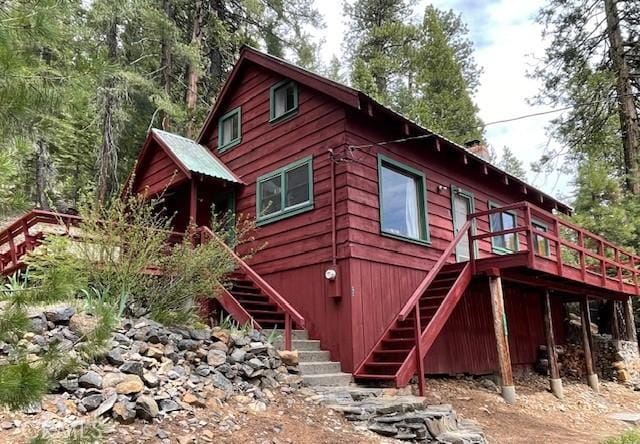 38784 Aspen Ln, Mineral, CA 96063 - rear view of house with stairway and a wooden deck