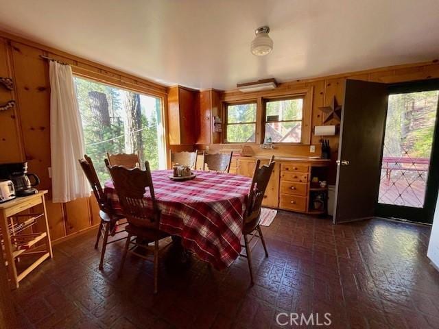 38784 Aspen Ln, Mineral, CA 96063 - dining area with healthy amount of natural light and brick patterned floors