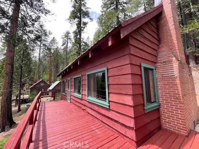 38784 Aspen Ln, Mineral, CA 96063 - view of side of property featuring a wooden deck and a chimney