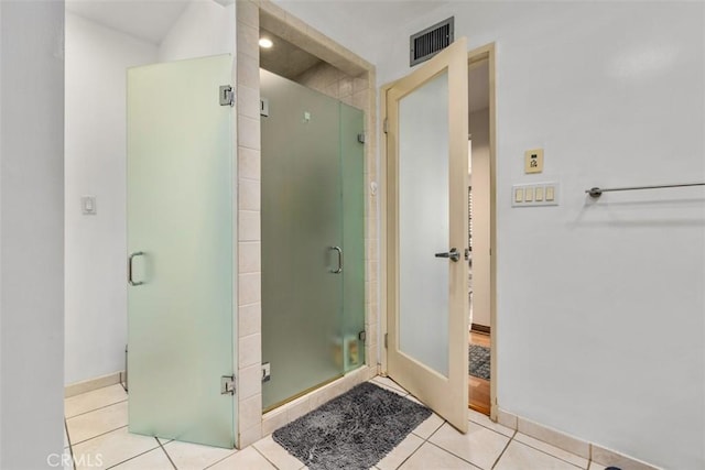 450 N Oakhurst Dr Unit 304, Beverly Hills, CA 90210 - full bath with tile patterned floors, a stall shower, and baseboards