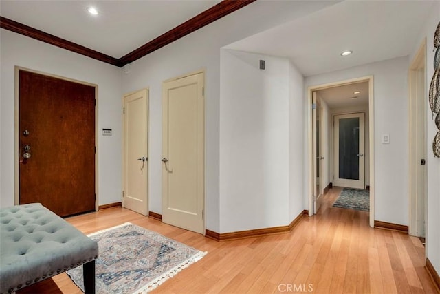 450 N Oakhurst Dr Unit 304, Beverly Hills, CA 90210 - hall with light wood-type flooring, baseboards, crown molding, and recessed lighting