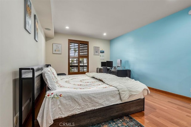 450 N Oakhurst Dr Unit 304, Beverly Hills, CA 90210 - bedroom featuring wood finished floors, recessed lighting, and baseboards