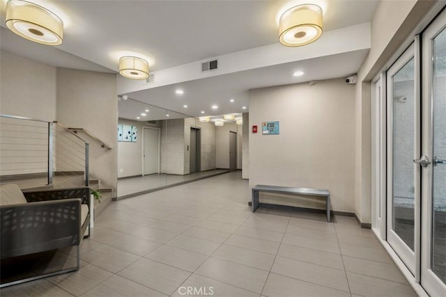 450 N Oakhurst Dr Unit 304, Beverly Hills, CA 90210 - community lobby featuring recessed lighting and stairway