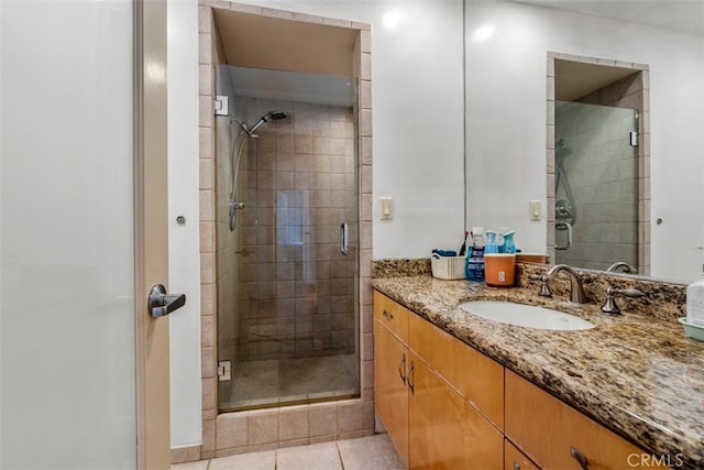 450 N Oakhurst Dr Unit 304, Beverly Hills, CA 90210 - bathroom featuring vanity, a stall shower, and tile patterned floors