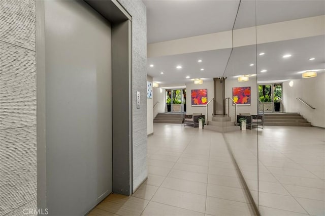 450 N Oakhurst Dr Unit 304, Beverly Hills, CA 90210 - building lobby featuring stairway and recessed lighting