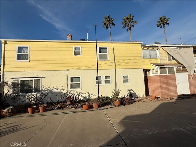 exterior space with stucco siding