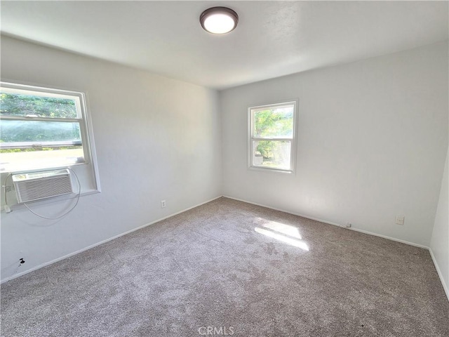 904 Toomes Ave, Corning, CA 96021 - carpeted empty room with plenty of natural light and baseboards