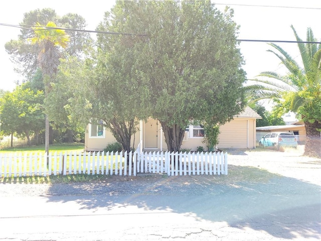 904 Toomes Ave, Corning, CA 96021 - obstructed view of property with a fenced front yard