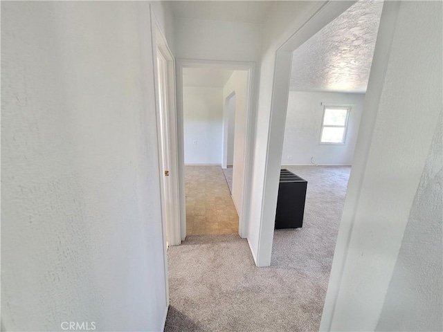 904 Toomes Ave, Corning, CA 96021 - hall featuring carpet and baseboards
