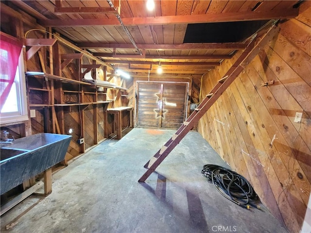 904 Toomes Ave, Corning, CA 96021 - basement featuring wood walls and wood ceiling