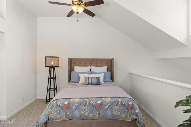 bedroom featuring baseboards, ceiling fan, and carpet