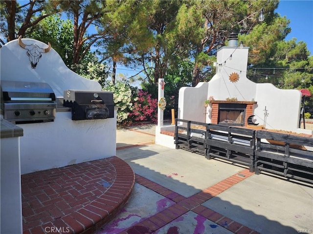 41184 Estates Ln, Palmdale, CA 93551 - view of patio with an outdoor fireplace and area for grilling