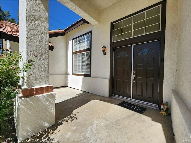 41184 Estates Ln, Palmdale, CA 93551 - entrance to property featuring stucco siding and a tile roof