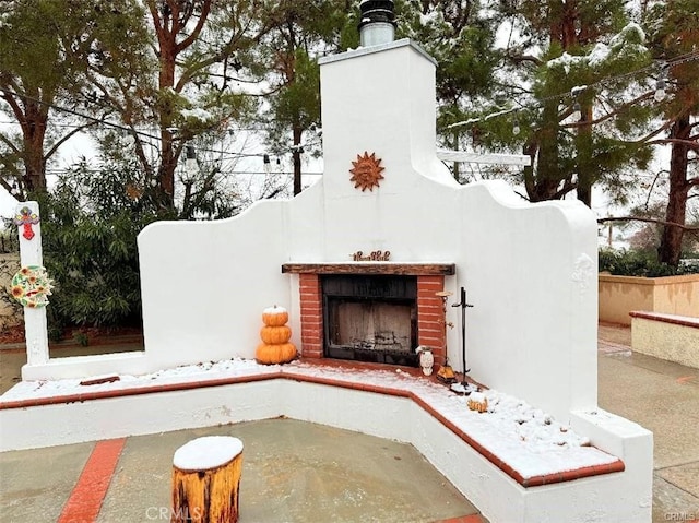 41184 Estates Ln, Palmdale, CA 93551 - view of patio / terrace with an outdoor brick fireplace