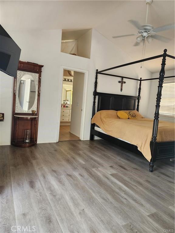 41184 Estates Ln, Palmdale, CA 93551 - bedroom with wood finished floors and lofted ceiling