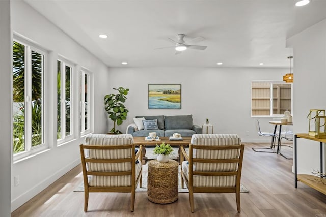 223 Cottingham Ct, Oceanside, CA 92054 - living area with healthy amount of natural light, light wood finished floors, ceiling fan, recessed lighting, and baseboards