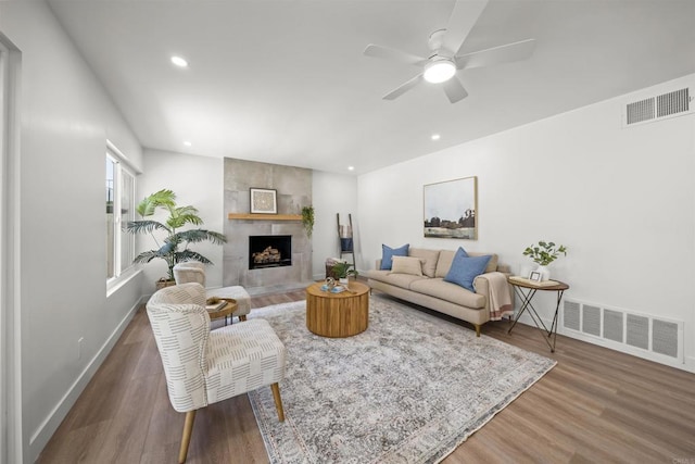 223 Cottingham Ct, Oceanside, CA 92054 - living room with wood finished floors, baseboards, a tile fireplace, and recessed lighting
