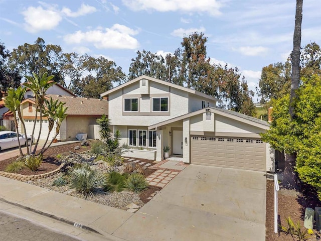 223 Cottingham Ct, Oceanside, CA 92054 - traditional-style home with stucco siding, an attached garage, and concrete driveway