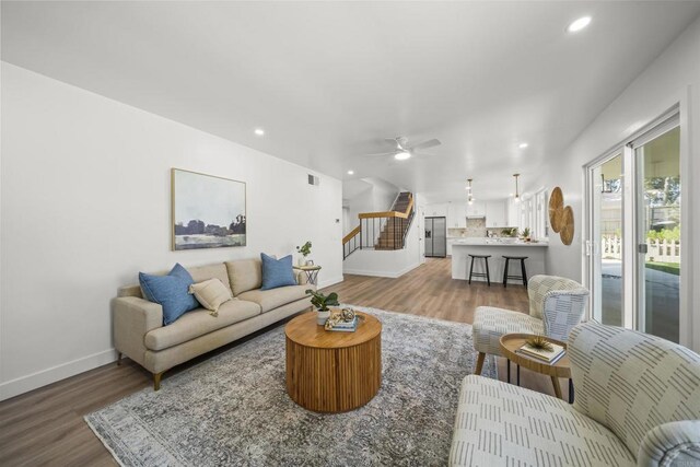 223 Cottingham Ct, Oceanside, CA 92054 - living room featuring wood finished floors, stairs, recessed lighting, and a ceiling fan