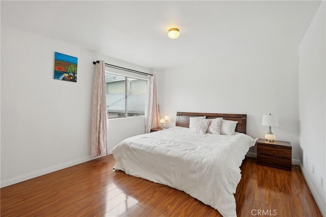 248 E Washington Blvd Unit 10, Pasadena, CA 91104 - bedroom featuring wood finished floors and baseboards
