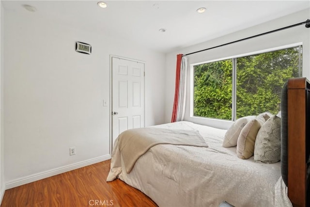 248 E Washington Blvd Unit 10, Pasadena, CA 91104 - bedroom featuring baseboards, wood finished floors, and recessed lighting