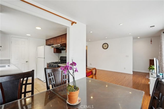 248 E Washington Blvd Unit 10, Pasadena, CA 91104 - dining space featuring recessed lighting, baseboards, and light wood-type flooring