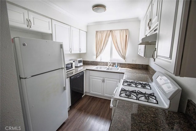 kitchen featuring a sink, white appliances, and white cabinetry