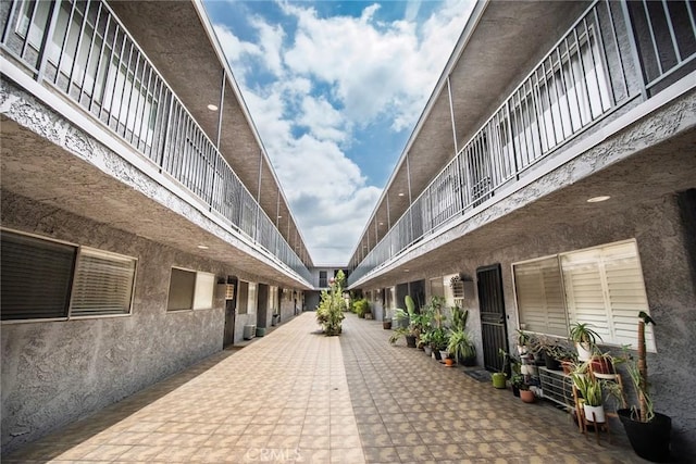 view of home's community with a patio area