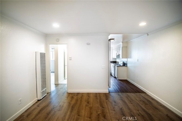 240 W Verdugo Ave Unit K, Burbank, CA 91502 - interior space with a heating unit, recessed lighting, baseboards, ornamental molding, and dark wood-style floors