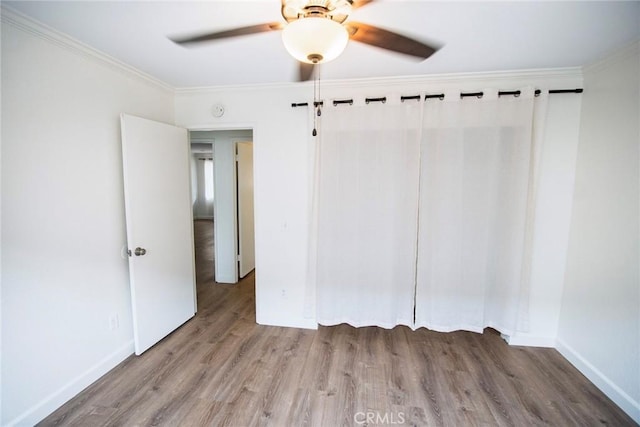 240 W Verdugo Ave Unit K, Burbank, CA 91502 - interior space with ornamental molding, baseboards, a ceiling fan, and wood finished floors