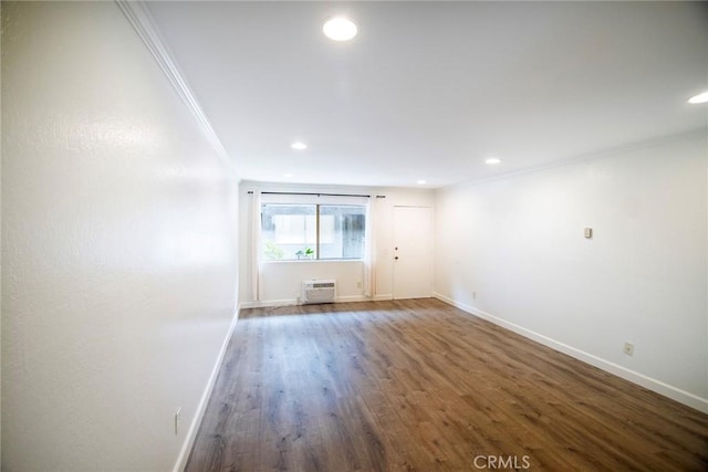 240 W Verdugo Ave Unit K, Burbank, CA 91502 - unfurnished room featuring wood finished floors, ornamental molding, recessed lighting, a wall mounted AC, and baseboards