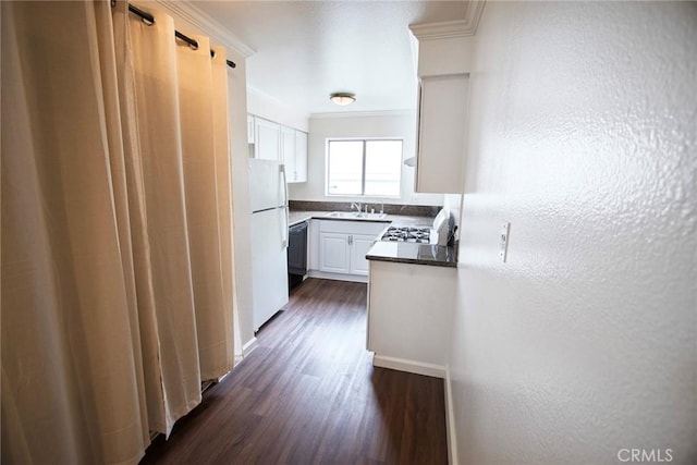 240 W Verdugo Ave Unit K, Burbank, CA 91502 - kitchen with black dishwasher, freestanding refrigerator, ornamental molding, dark wood finished floors, and dark countertops